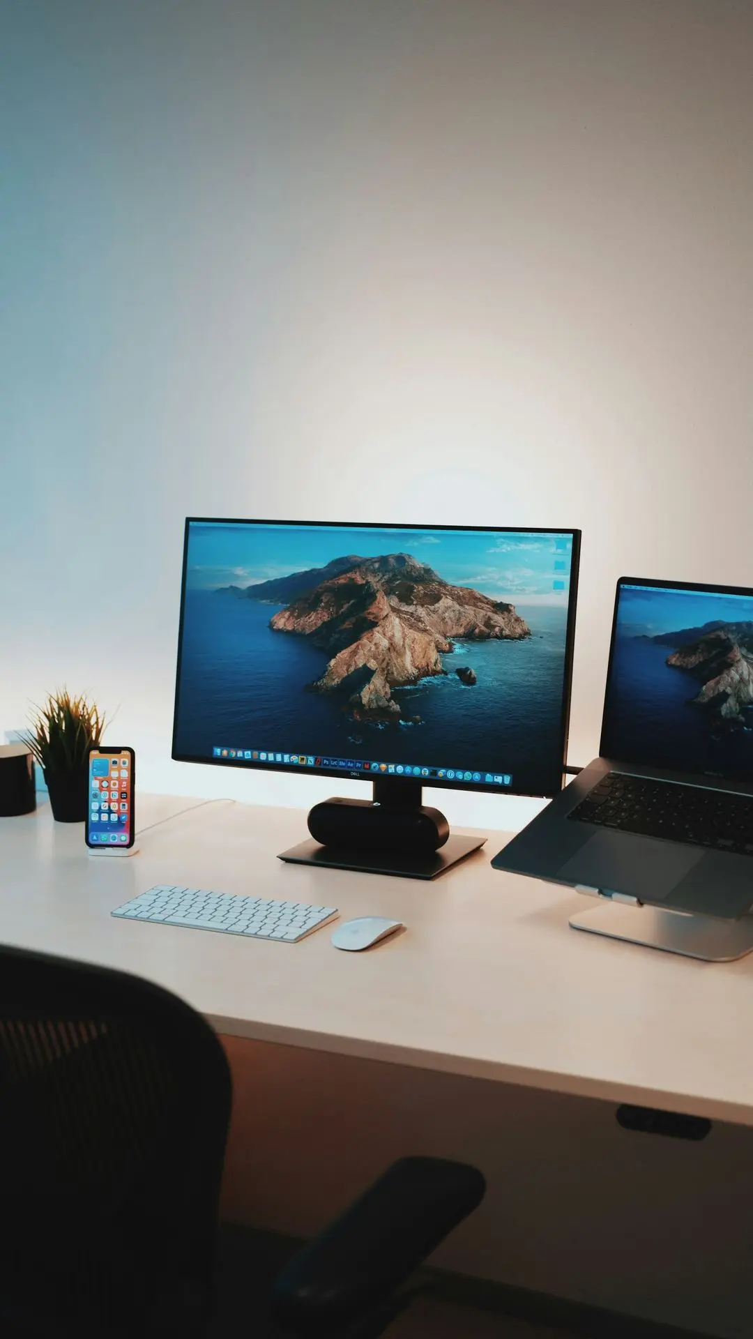 black flat screen computer monitor on white table